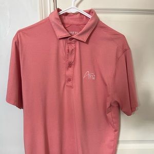 Matte Grey golf shirt with Aria logo in medium.  Orange color in Great condition